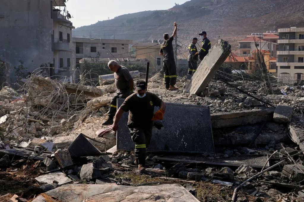 Israeli airstrikes kill 12 people, including two children, in southern Lebanon