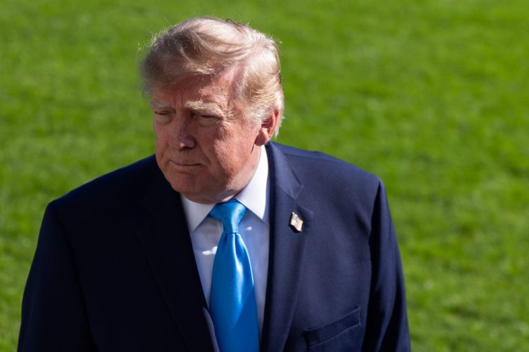 President Donald Trump takes questions from reporters.
