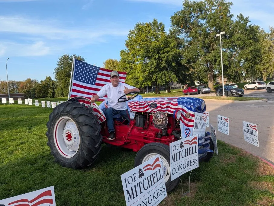 Iowan brings ‘patriotic tractor’ to support House hopeful Joe Mitchell ahead of debate