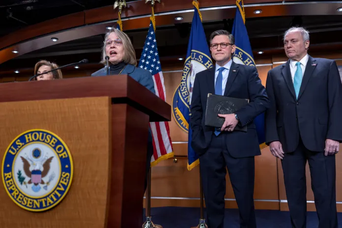 Speaker of the House Mike Johnson, R-La., center, is flanked by Rep. Mariannette Miller-Meeks, R-Iowa, left, and House Majority Leader Steve Scalise, R-La., right, as they meet with reporters to discuss the Republicans plan to address growing health care costs, at the Capitol in Washington in 2025.