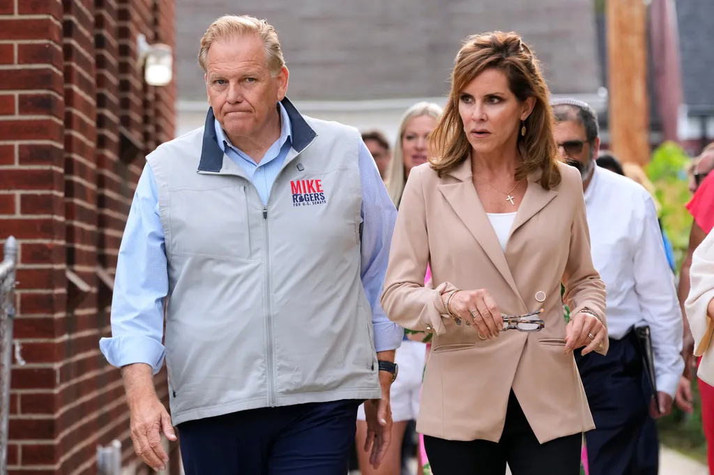 Mike Rogers’s wife hands out fuel gift cards at gas station as Michigan Senate race heats up