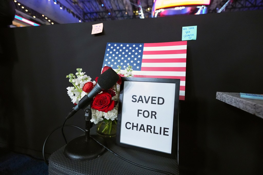 Post-it notes are placed behind a memorial for Charlie Kirk at the "Creators Deck" for the media, at the Republican convention Thursday, Sept. 10, 2026, in Dallas.