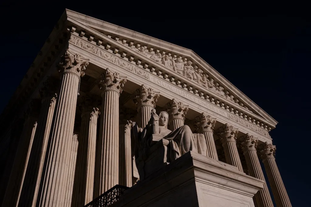 The statue Contemplation of Justice at the Supreme Court is seen at day's end in Washington.