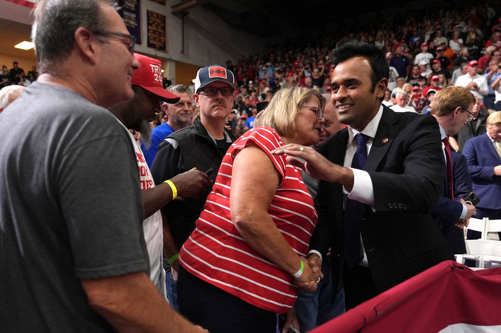 Ohio Republican gubernatorial candidate Vivek Ramaswamy, right, greets attendees before President Donald Trump arrives to speak during an event at Butler High School in Vandalia, Ohio, Saturday, Oct. 3, 2026.