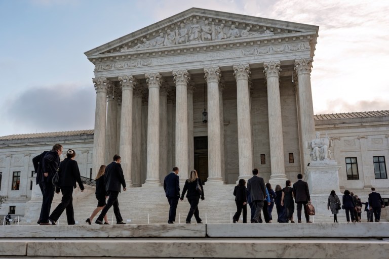 People gather outside the Supreme Court in Washington.