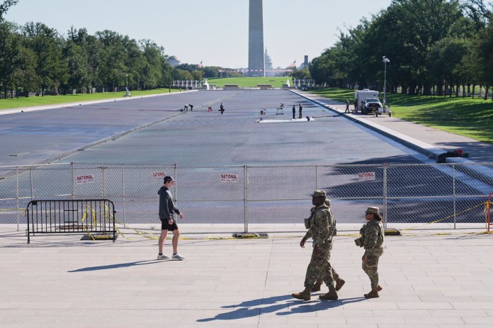 Work continues on the Lincoln Memorial Reflecting Pool, Wednesday, Oct. 7, 2026, in Washington.