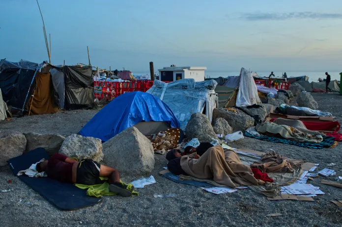 Migrants, some of them minors, sleep on El Trampolín Beach in the Spanish enclave of Ceuta, Thursday, Oct. 1, 2026.