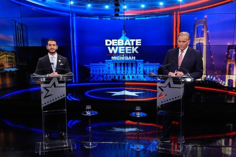 Abdul el Sayed and Mike Rogers during a televised debate.