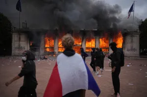 Trump tells France ‘close your borders’ as police arrest 1,800 in violent protests