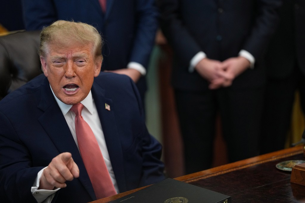 President Donald Trump speaks in the Oval Office of the White House.