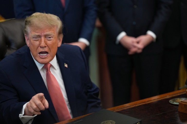 President Donald Trump speaks in the Oval Office of the White House.