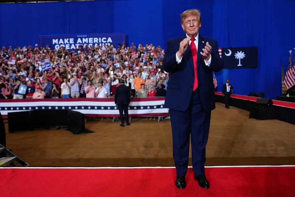 Trump applauds rallygoer for punching protester: ‘He got whacked’