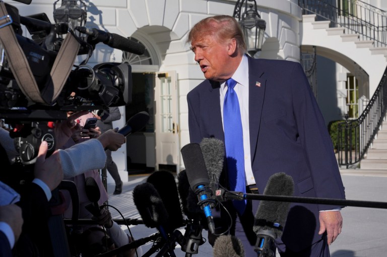 President Donald Trump speaks to reporters before walking to board Marine One on the South Lawn of the White House.