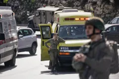 Israel shuts down West Bank after two soliders shot dead by Palestinian gunmen