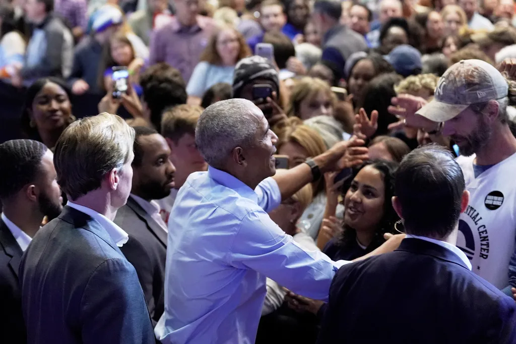 Obama draws packed crowds, protests, and political heat at Detroit rally