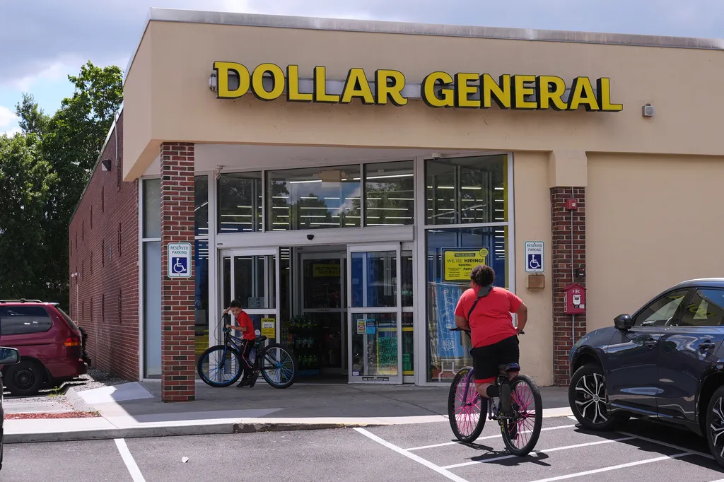 Children ride their bicycles to the Dollar General store.