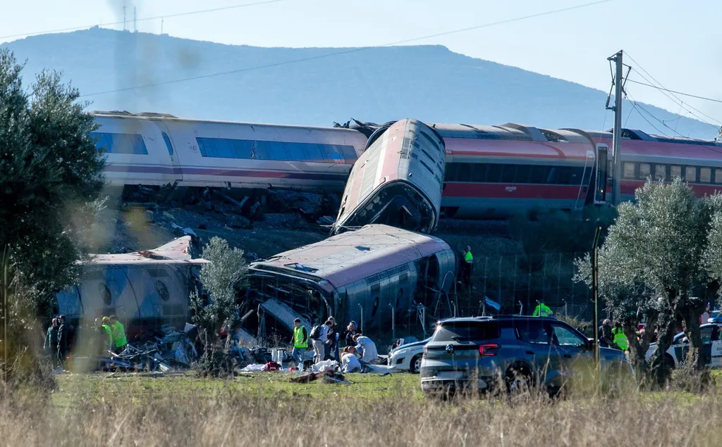 At least 30 dead in crash between 2 trains in central Spain