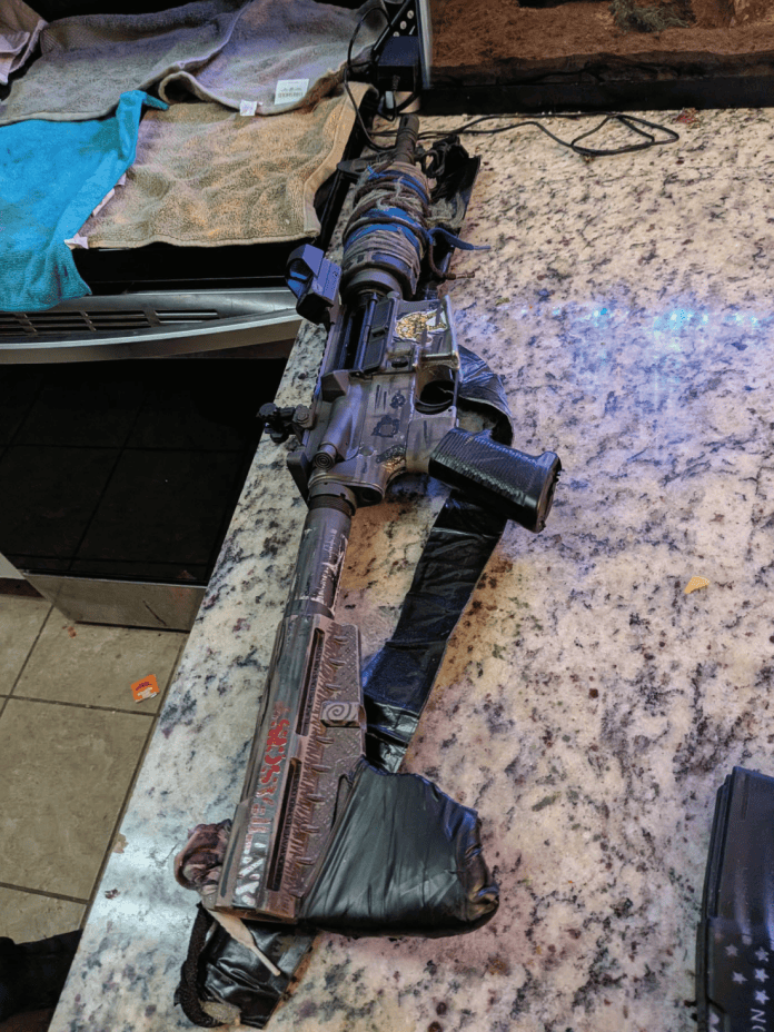 A rifle marked "ANTI FASCIST"