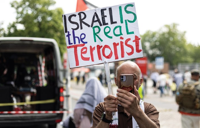 A sign displayed during a demonstration in Berlin, July 18, 2026. (Vasily Krestyaninov/SOPA Images/LightRocket/Getty)