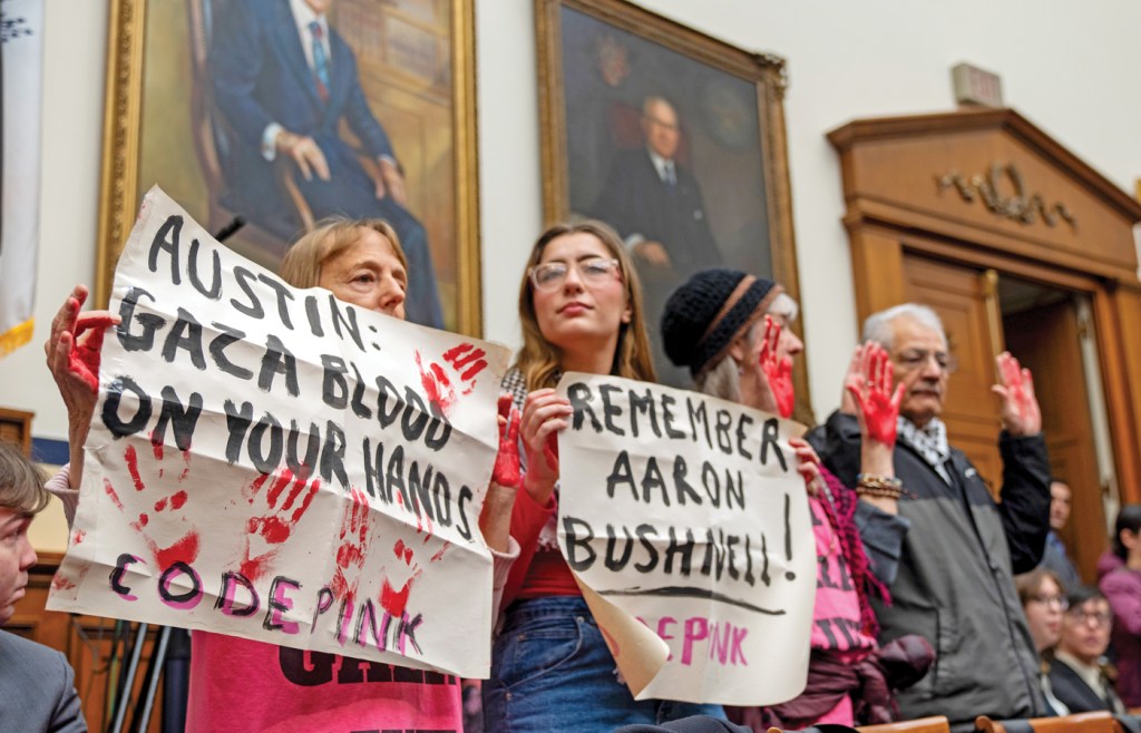 Code Pink protesters disrupt testimoney by Biden administration Secretary of Defense Lloyd Austin before the House Armed Services Committee, Feb. 29, 2024. (Jacquelyn Martin/AP)