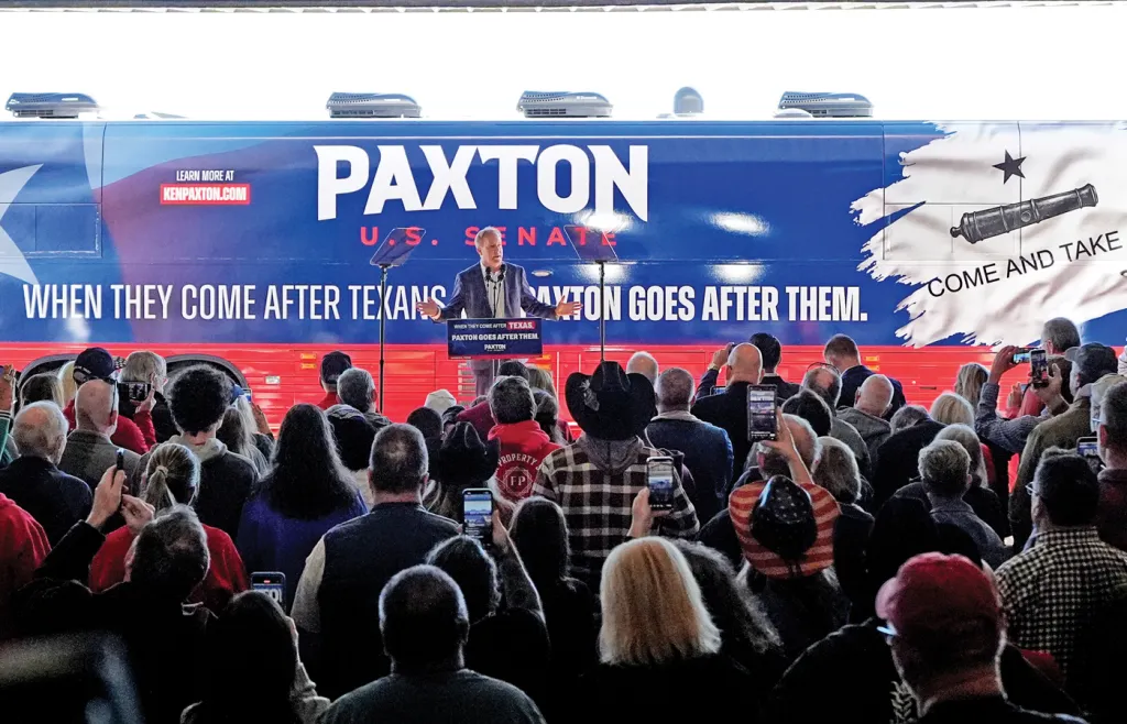 Republican Senate candidate and Texas Attorney General Ken Paxton, at podium, kicks off a bus tour in Rockwall, Texas, Oct. 17, 2026. (Tony Gutierrez/AP)