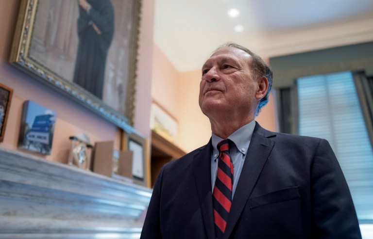 Associate Justice Samuel Alito stands in his chambers at the Supreme Court in Washington, on Sept. 29. (J. Scott Applewhite/AP)