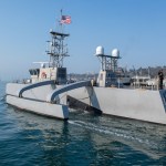 The Roosevelt carrier strike group deployed with a 135-foot drone boat. Here’s what that looks like