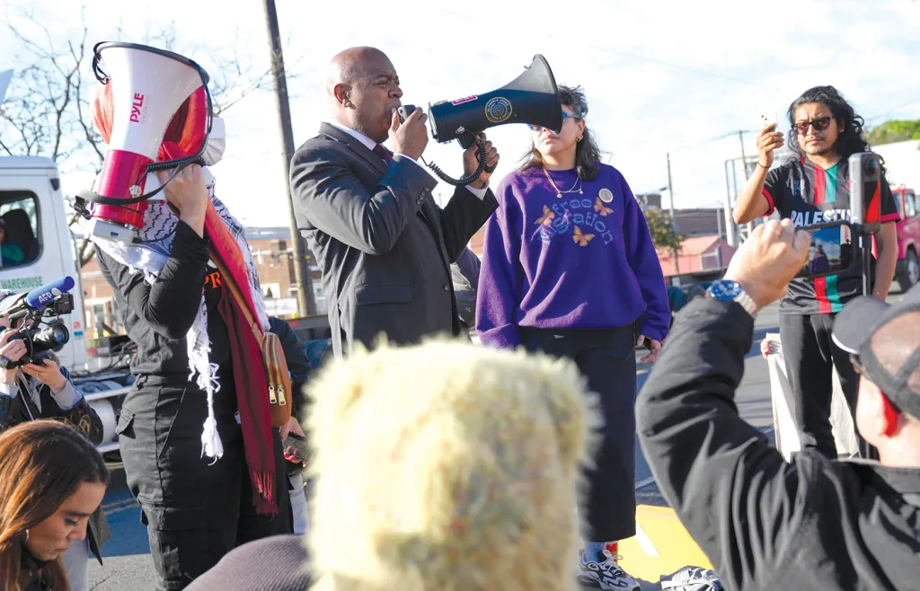 Newark Mayor Ras Baraka (D) speaks to protesters outside of Delaney Hall, an immigration detention center, in Newark, New Jersey, on May 7, 2025. (Seth Wenig/AP)