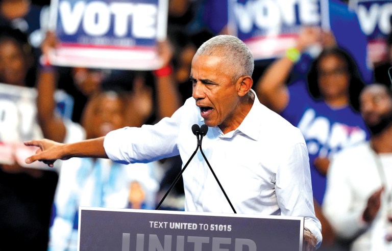 Former President Barack Obama speaks in support of Democratic candidates Sen. Jon Ossoff and Democratic gubernatorial candidate Keisha Lance Bottoms during a rally on Oct. 28 in Morrow, Georgia. (Brynn Anderson/AP)