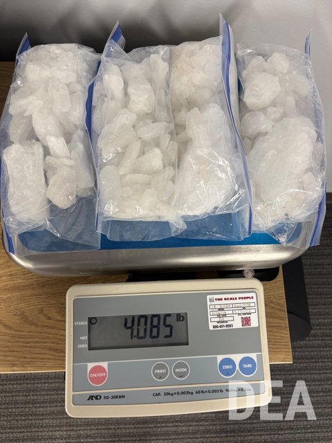 Recovered trafficked drugs on a scale.